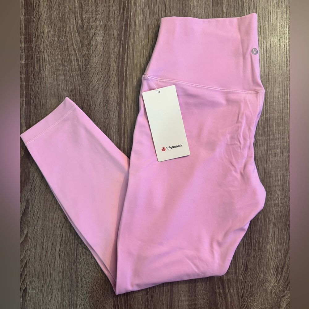 New with tags Lululemon Align high rise pant 25” Vitapink. Baby Pink. Size 12.